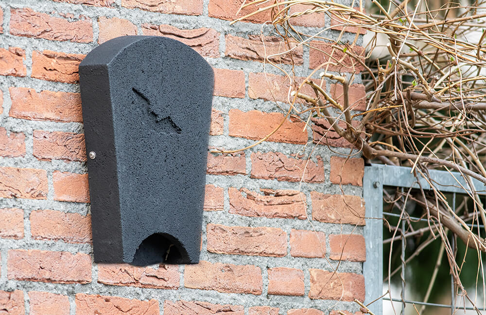 A bat box made out of woodstone.